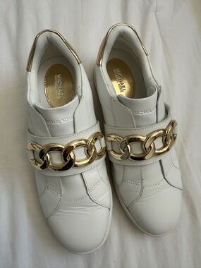 Michael Kors White Leather Slip-On Sneakers with Gold Chain Accent